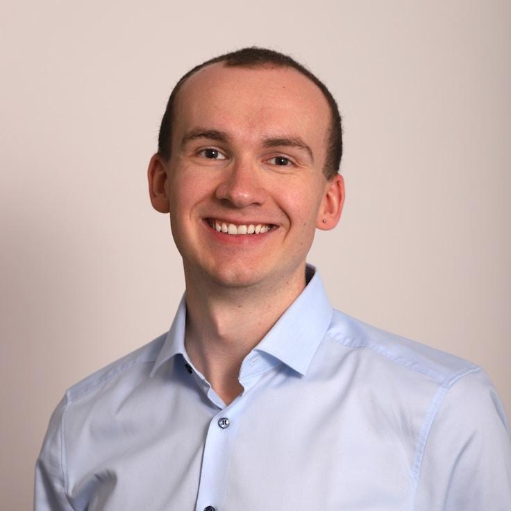 Jordan Lee, Client Relations Director, discussing corporate gifting strategy with business clients