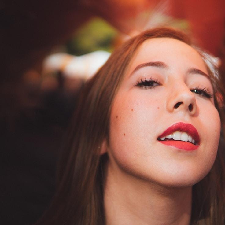 Alex Carter, Lead Design Curator at Forest Lumen Parcel, reviewing corporate floral arrangements